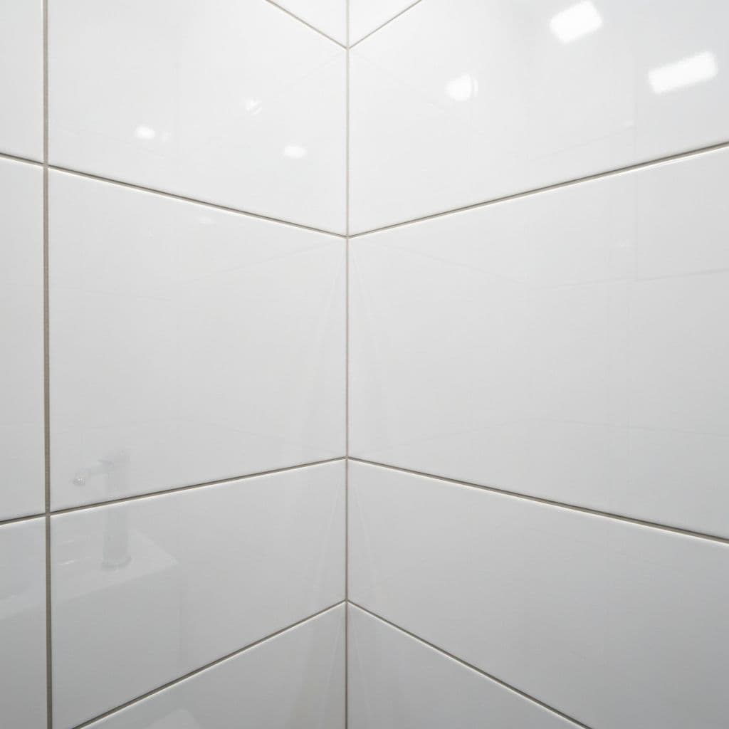 Clean bathroom corner after professional treatment